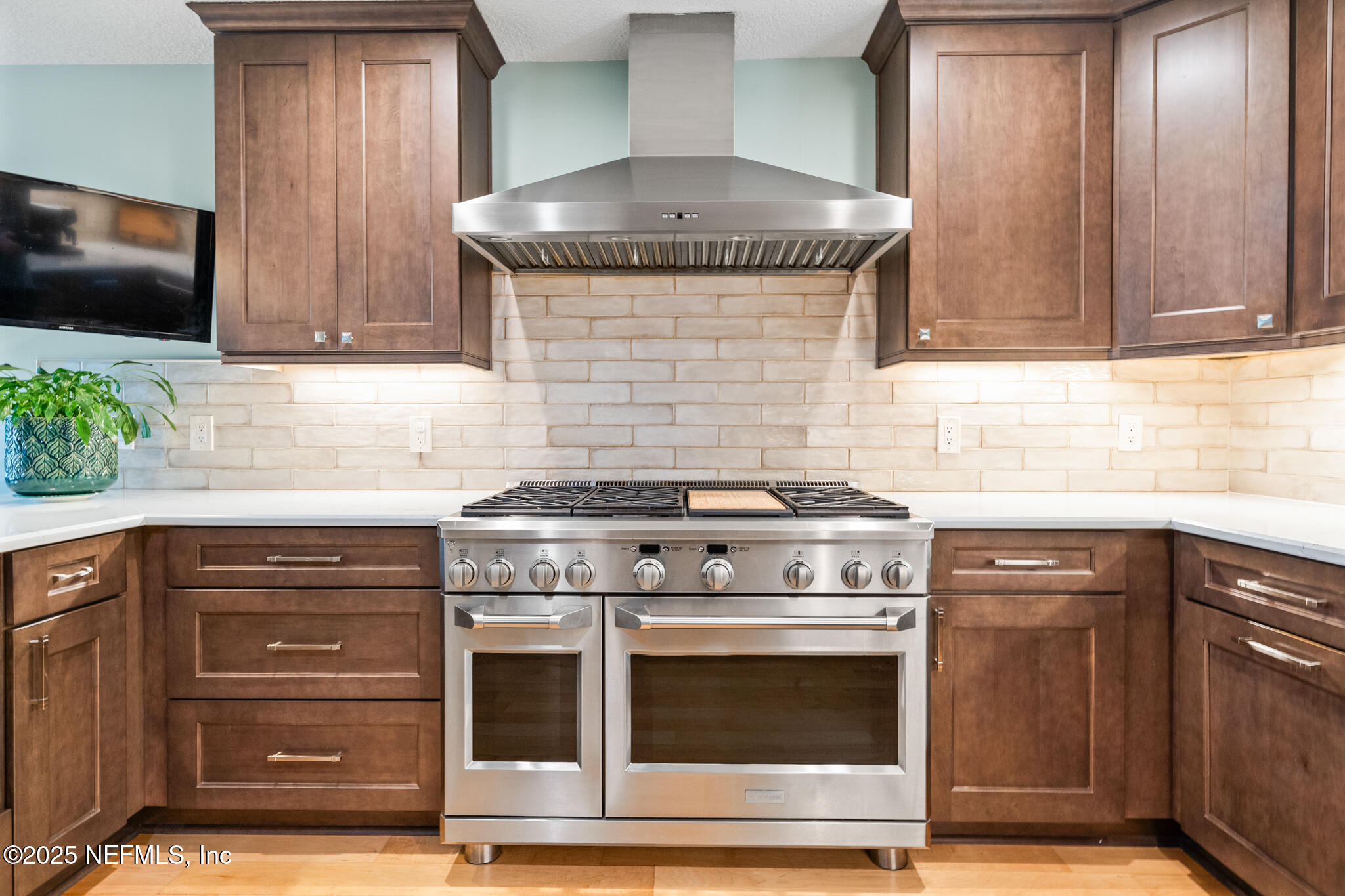 1836 Nightfall Drive Neptune Beach, FL 32266 - Photo 8 of 56 a kitchen with granite countertop a stove and a sink