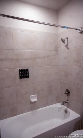 a bathroom with a bathtub