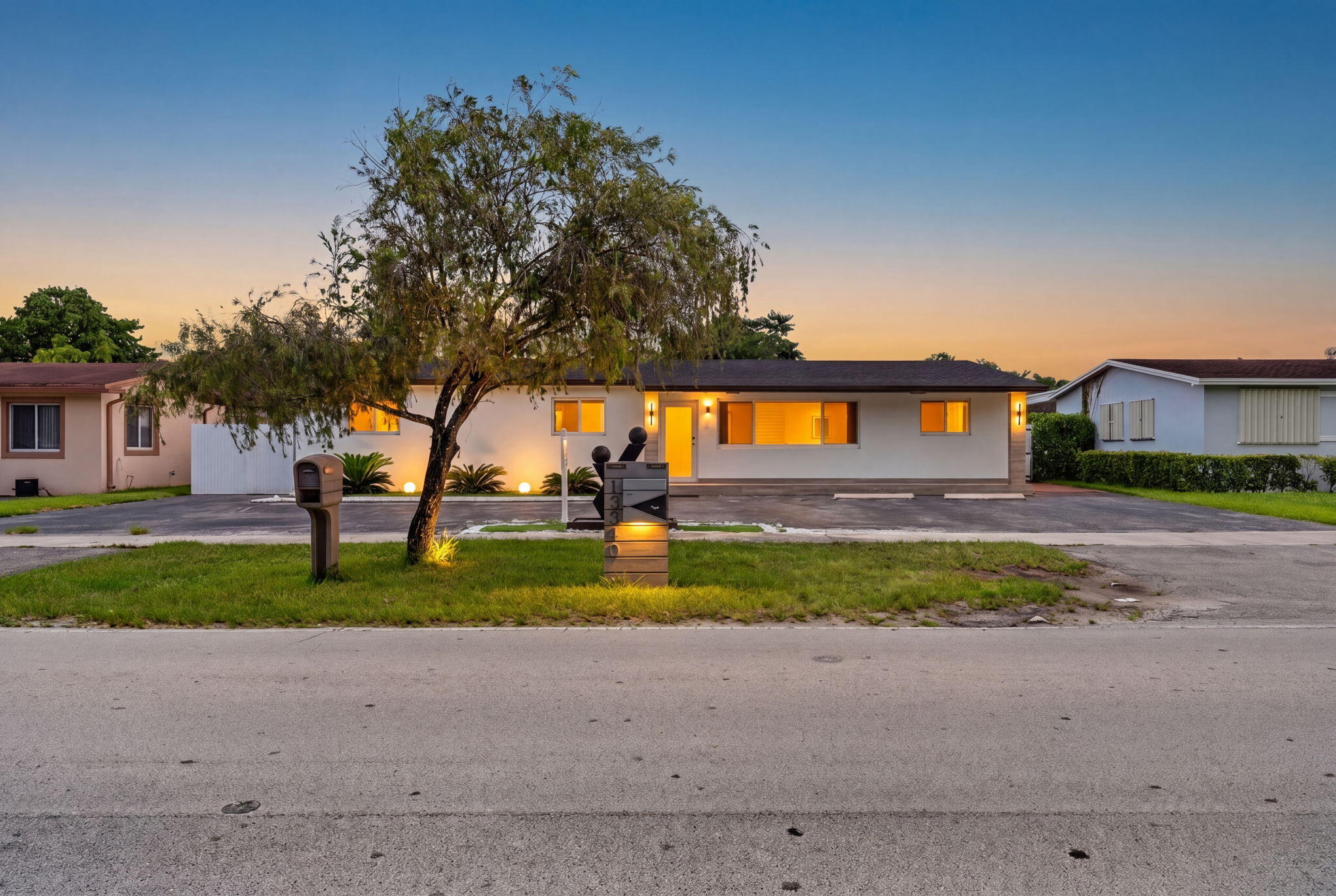 10040 Southwest 32nd Street Miami, FL 33165 - Photo 1 of 28 1-web-or-mls-Twilight_Exterior_DSC04539_