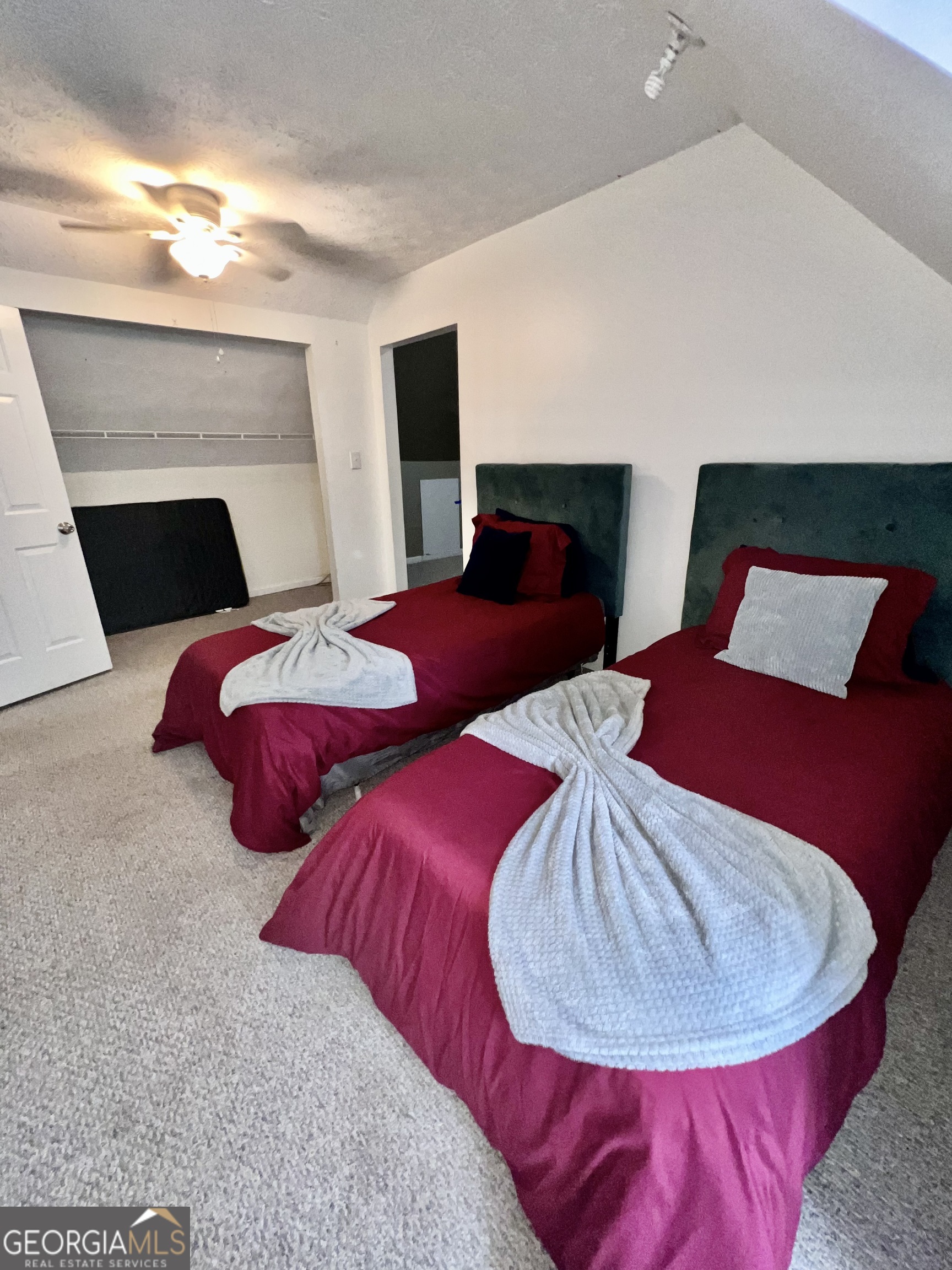 256 Cherokee Ridge Athens, GA 30606 - Photo 14 of 35 a bedroom with two beds and a fireplace