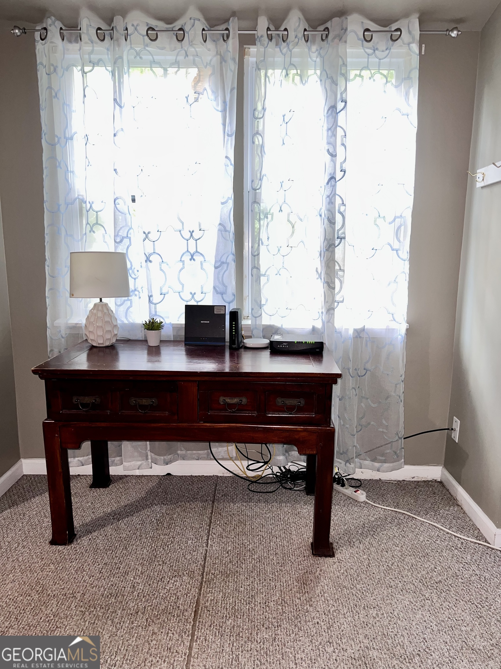 256 Cherokee Ridge Athens, GA 30606 - Photo 19 of 35 a view of a workspace with a window and a table