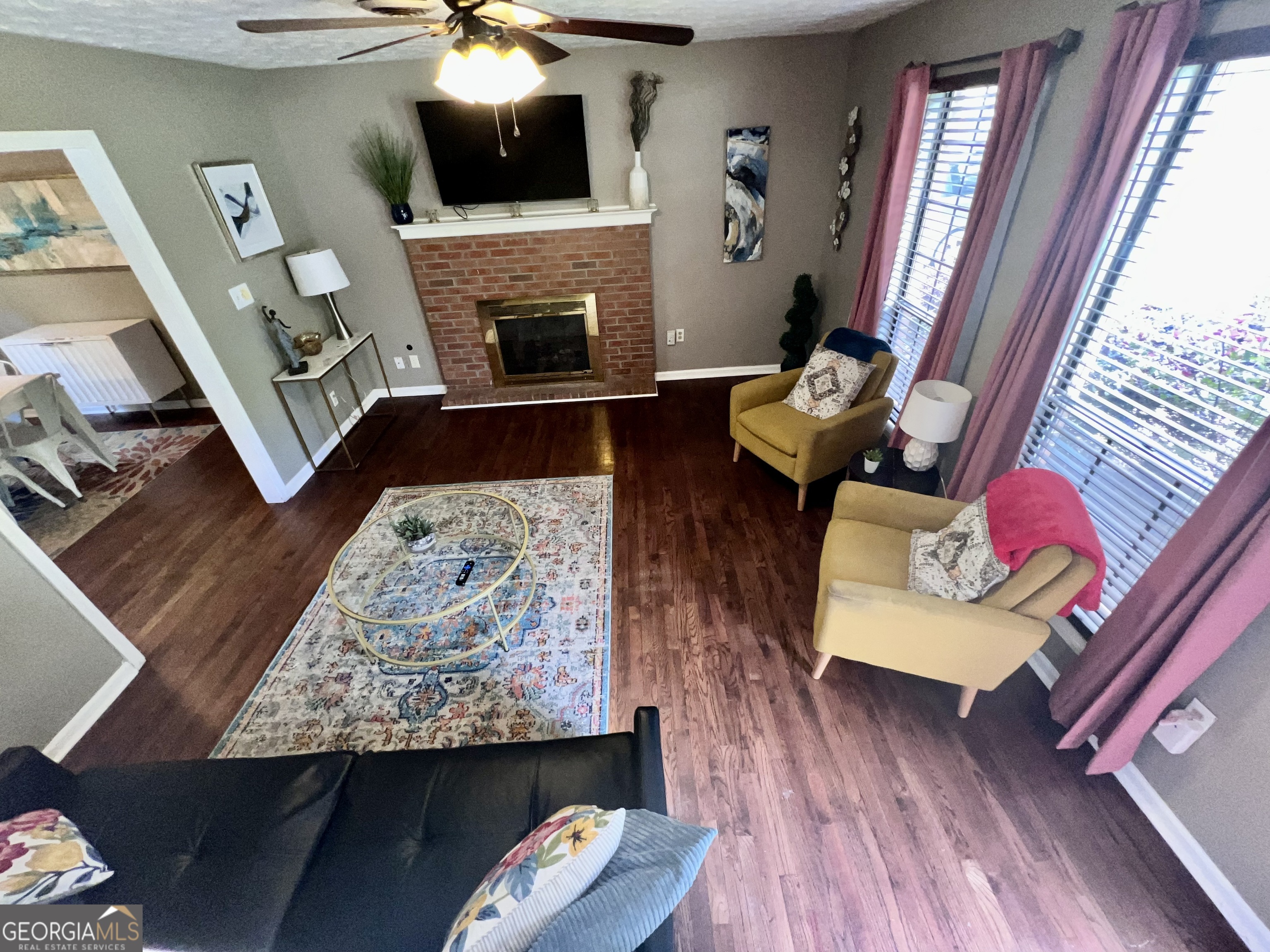 256 Cherokee Ridge Athens, GA 30606 - Photo 2 of 35 a living room with furniture and a fireplace