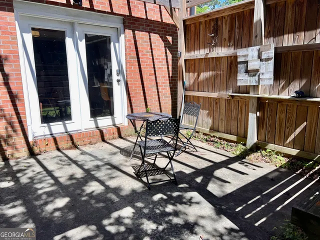 a view of a chairs and table on the wooden floor
