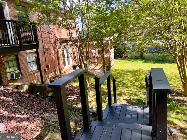 a view of swimming pool from a balcony