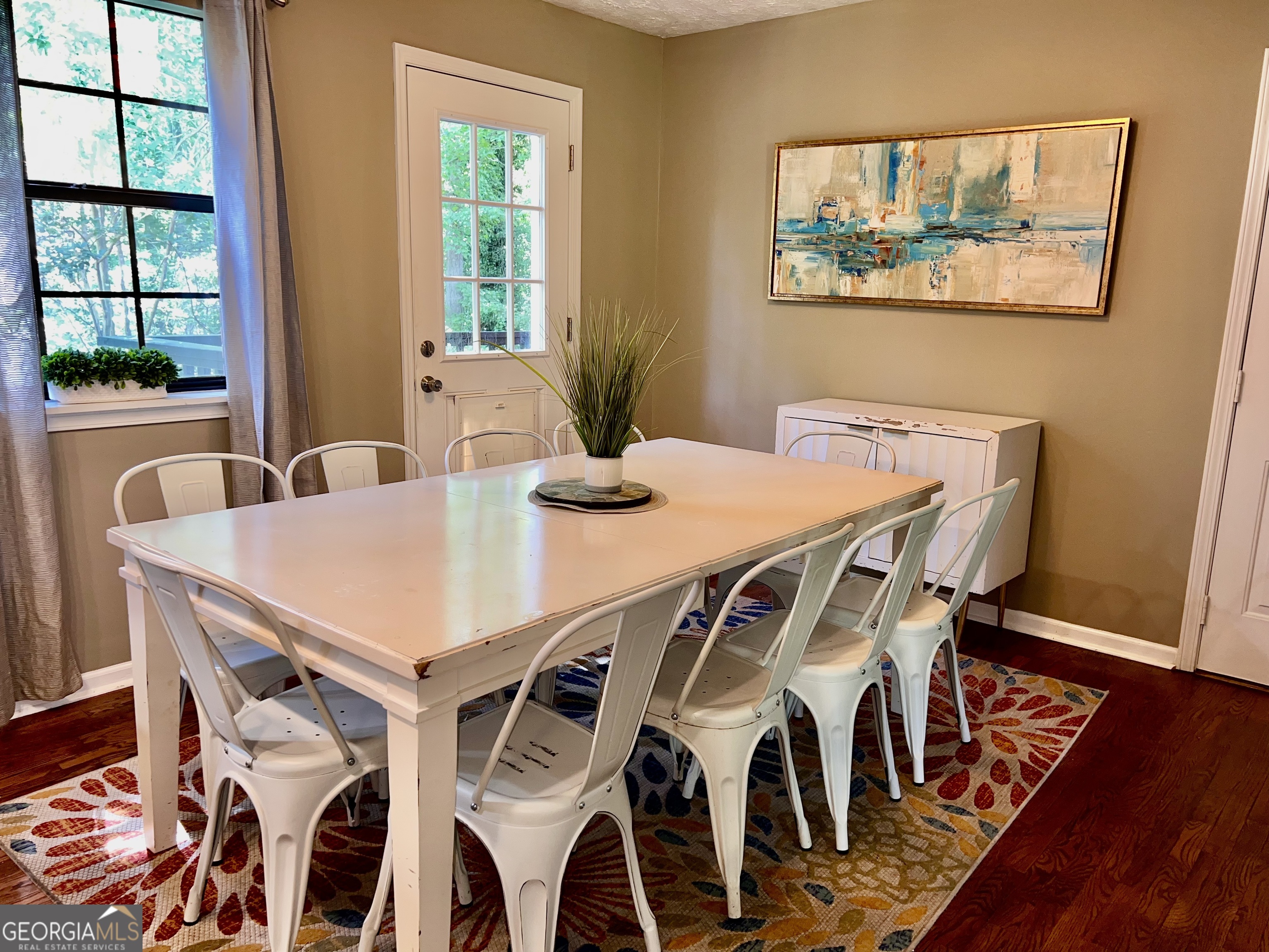 256 Cherokee Ridge Athens, GA 30606 - Photo 4 of 35 a view of a dining room with furniture and wooden floor