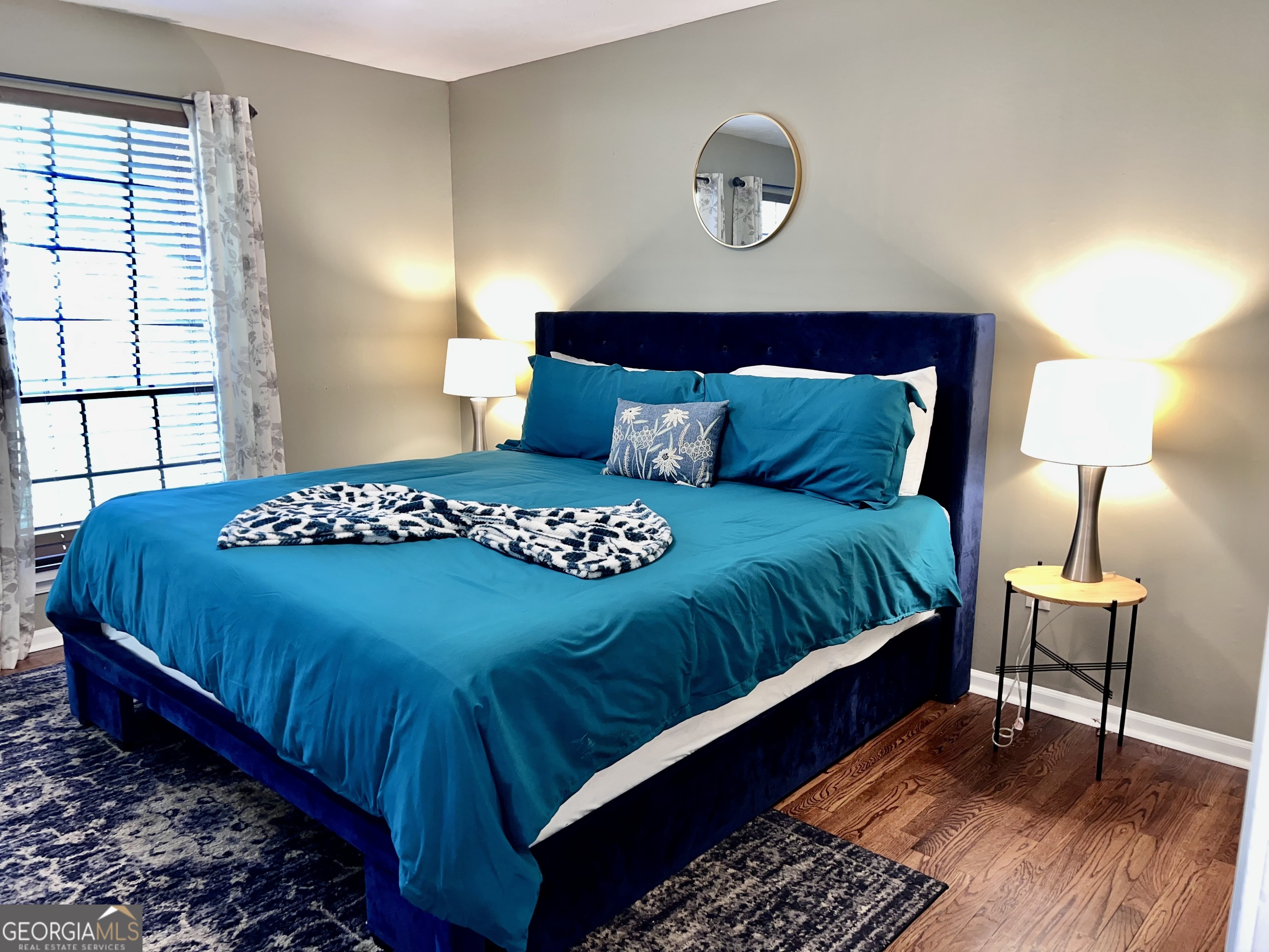 256 Cherokee Ridge Athens, GA 30606 - Photo 9 of 35 a bedroom with a bed and a lamp