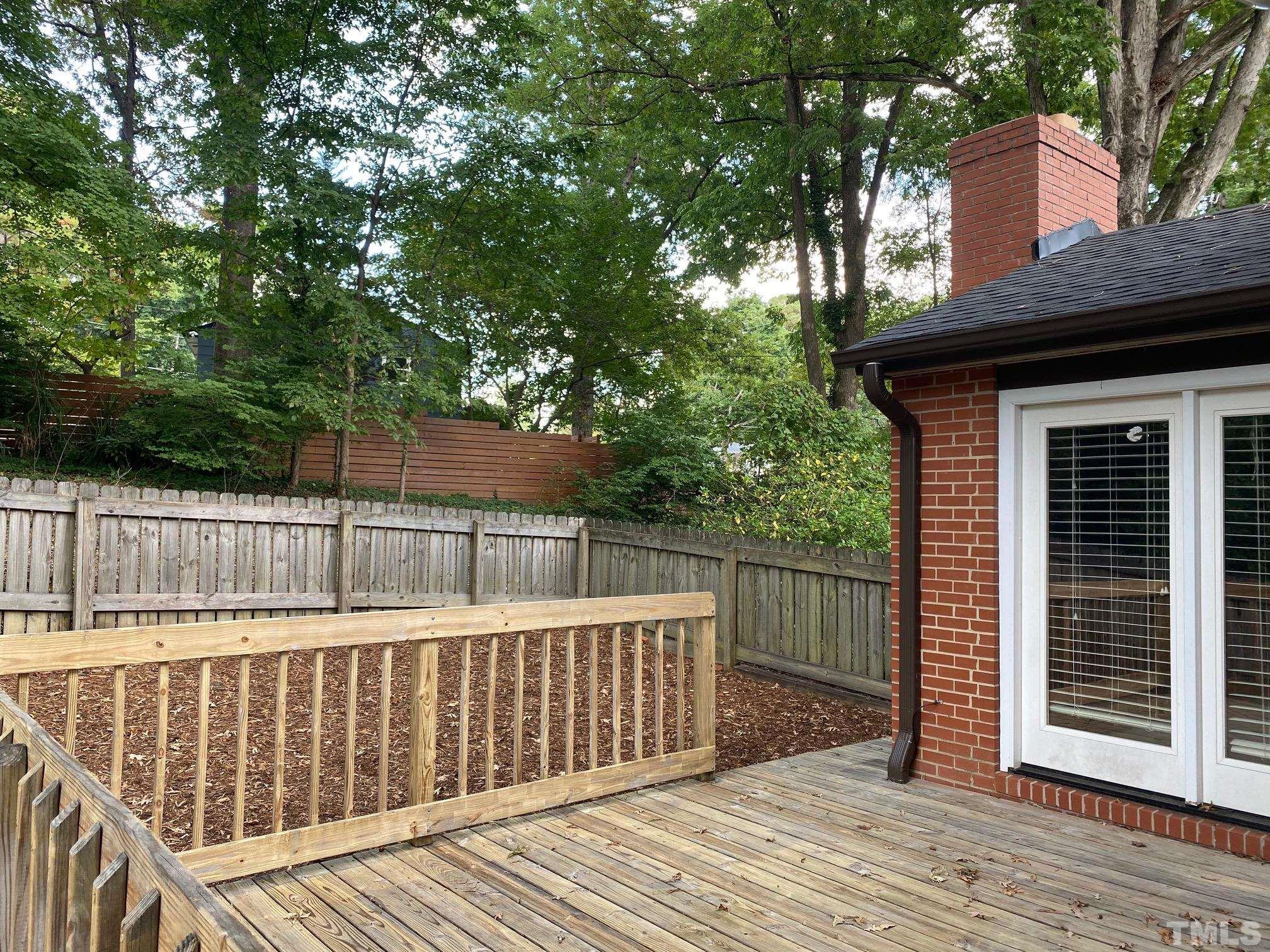 2101 Watkins Street Raleigh, NC 27604 - Photo 13 of 15 a view of a wooden deck