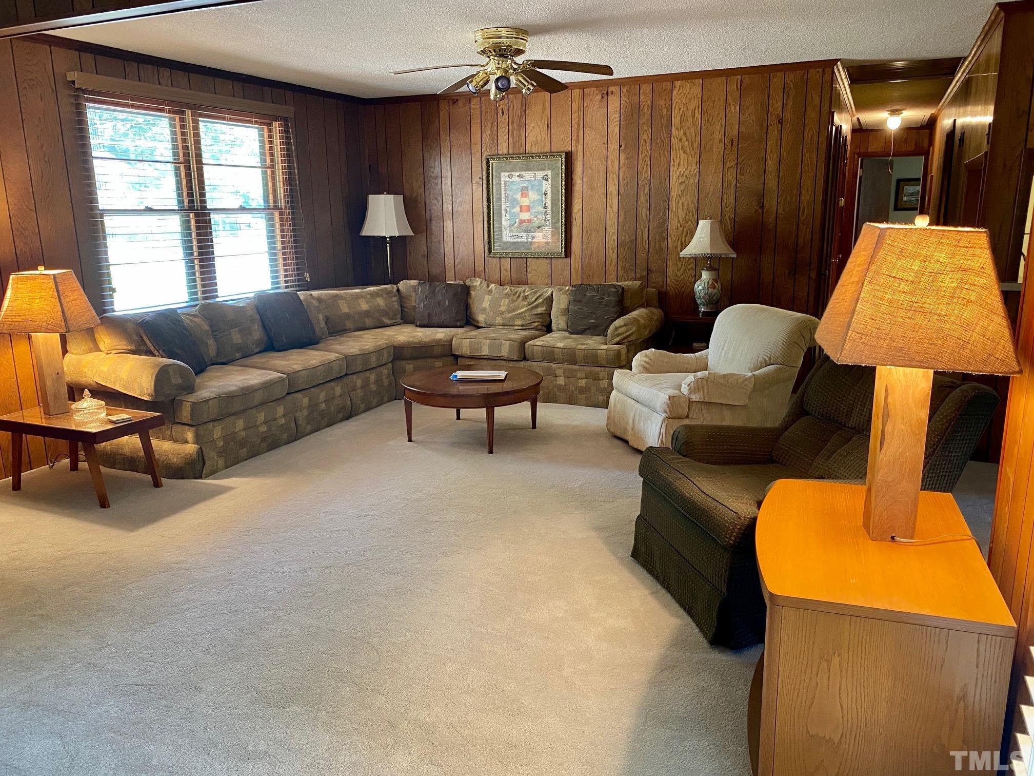 2101 Watkins Street Raleigh, NC 27604 - Photo 5 of 15 a living room with furniture and window