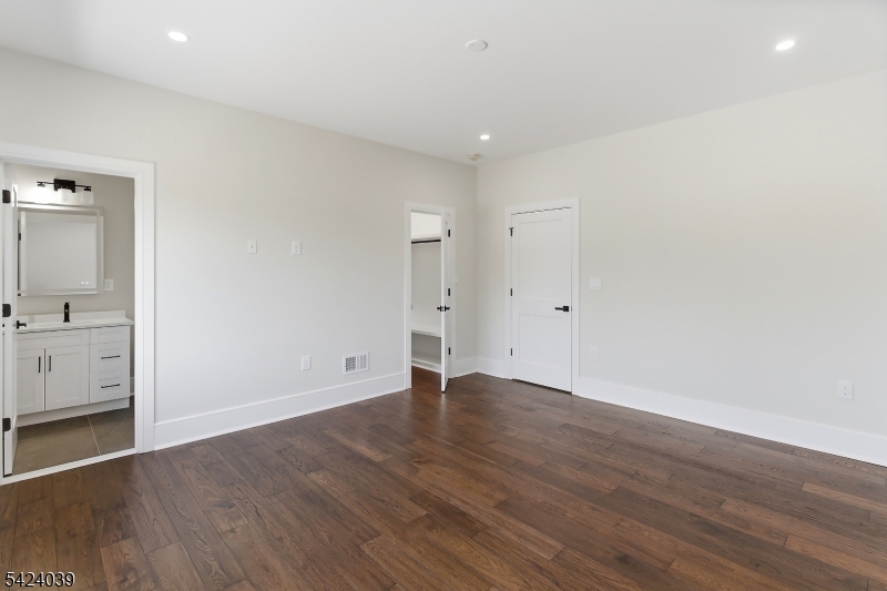 45 Kildee Road Belle Mead, NJ 08502 - Photo 25 of 43 a view of an empty room with wooden floor and a sink