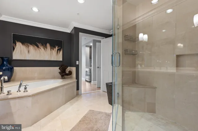 a bathroom with a bathtub and a sink