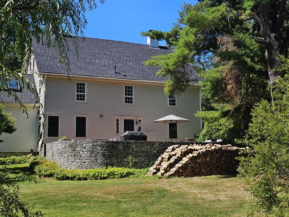 608 River Road Newcastle, ME 04553 - Photo 14 of 102 Generous patio with stone wall.