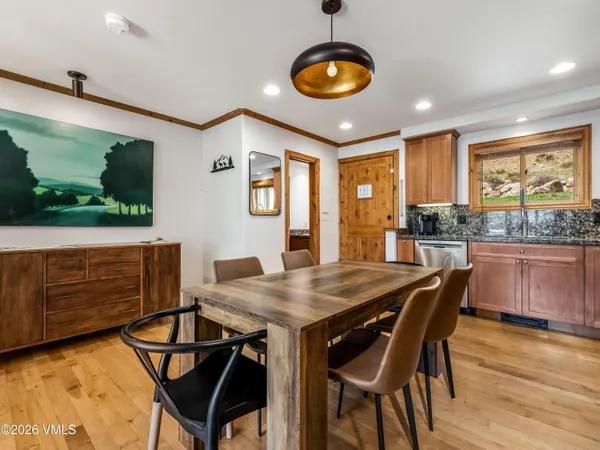 a kitchen with granite countertop a stove and a sink
