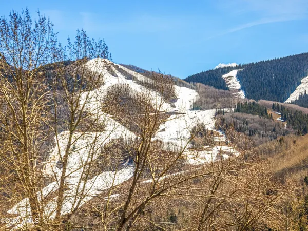a view of a balcony with city view
