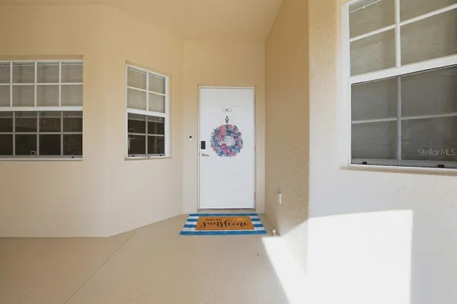 a view of hallway with washer and dryer