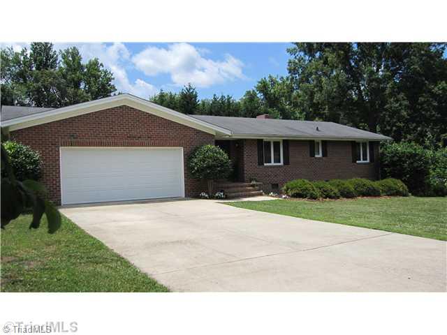 Exterior Front. All brick Ranch in Summerfield