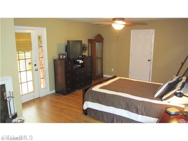 3801 Waterton Road Summerfield, NC 27358 - Photo 11 of 16 Master Bedroom. Over sized bedroom with plenty of space for a sitting area in front of the fireplace