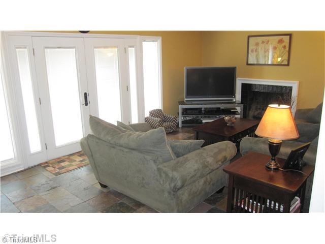 Den/Family/Great Room. Family room opens into the Dining area and on to the rear deck