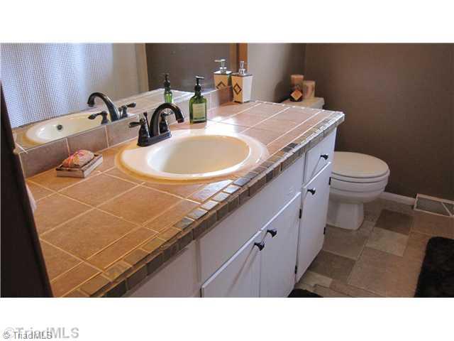3801 Waterton Road Summerfield, NC 27358 - Photo 10 of 16 Other Bath. Second Bath with lots of beautiful tile work