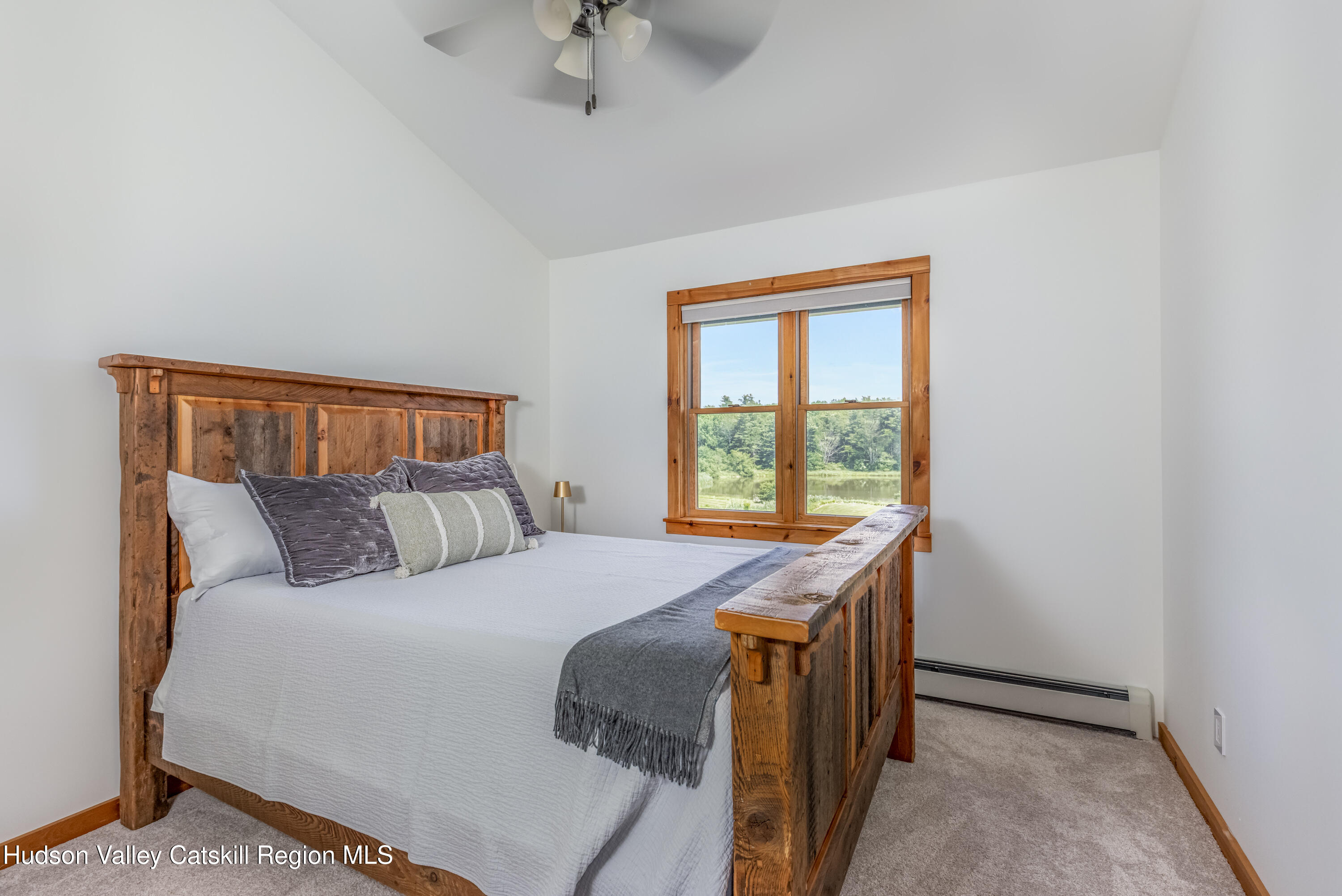 688 Bruce Porn Road Gilboa, NY 12167 - Photo 83 of 104 a bedroom with a bed and a window