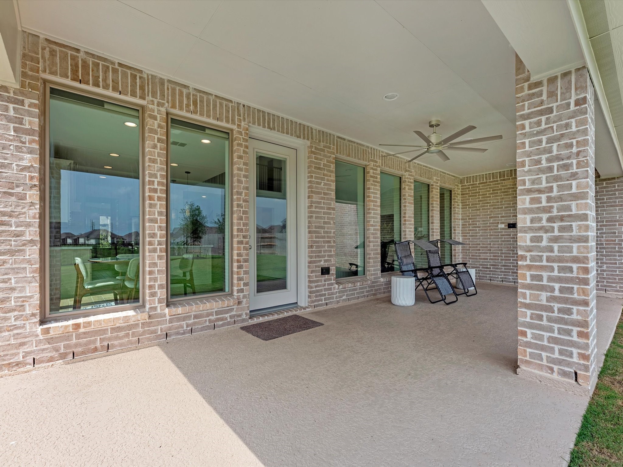18714 Pistachio Way Manvel, TX 77578 - Photo 40 of 48 Designed with entertaining in mind, the covered patio is already equipped with a gas connection for a future outdoor kitchen and a dedicated electrical outlet for an outdoor television.