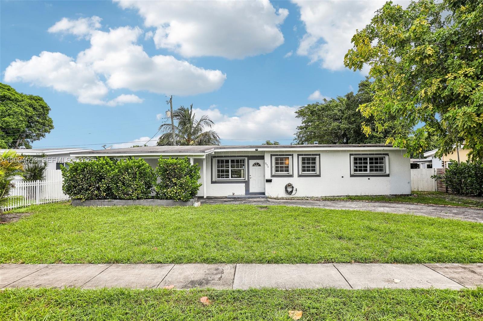 571 Northeast 172nd Street North Miami Beach, FL 33162 - Photo 33 of 33 Front of the home, street view