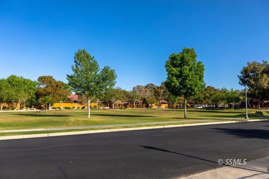 420 Montefino Drive Ridgecrest, CA 93555 - Photo 38 of 38 a view of a swimming pool and a yard