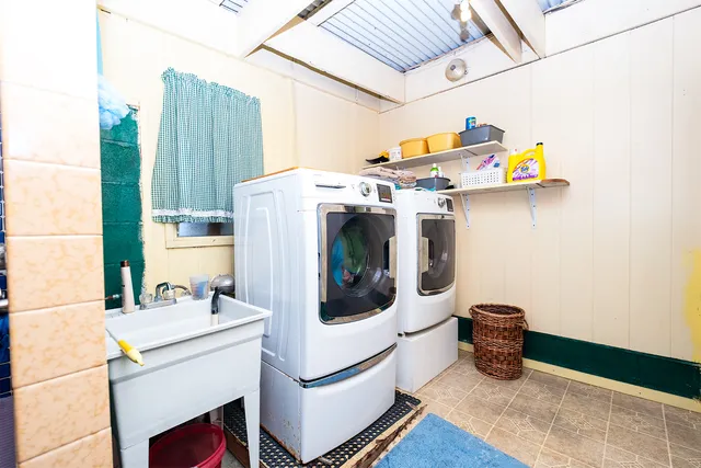 a utility room with dryer and washer