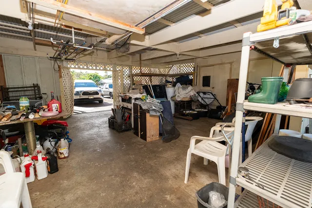 a view of a garage with the kitchen