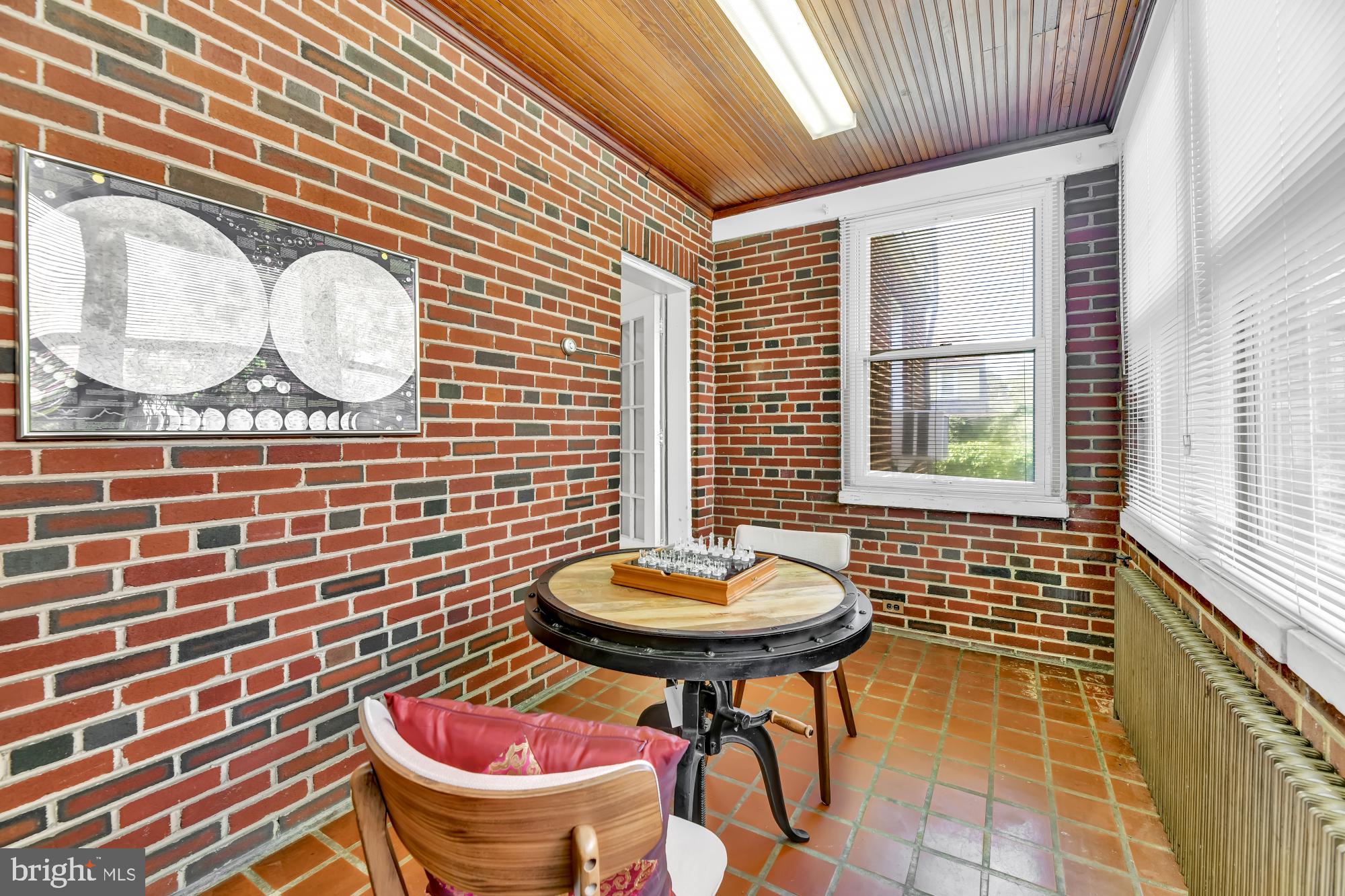 420 Westgate Road Baltimore, MD 21229 - Photo 8 of 30 Awesome Sunroom with exposed brick walls!