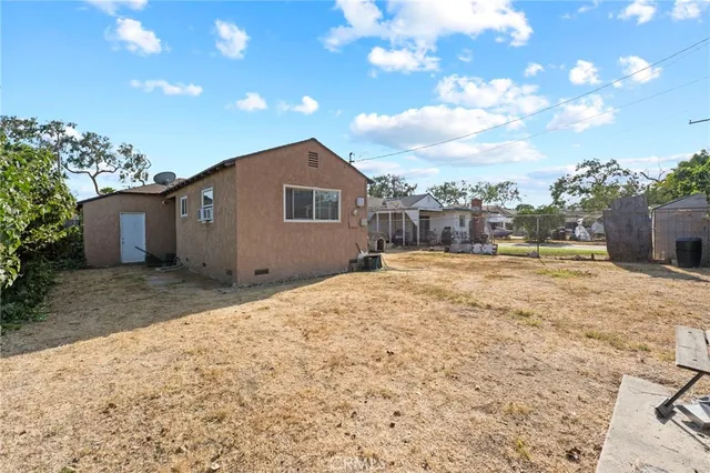 a house view with a garden space