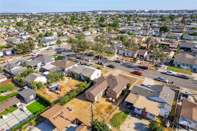 an aerial view of house with a yard