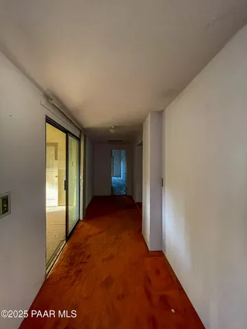 a view of an empty room and window