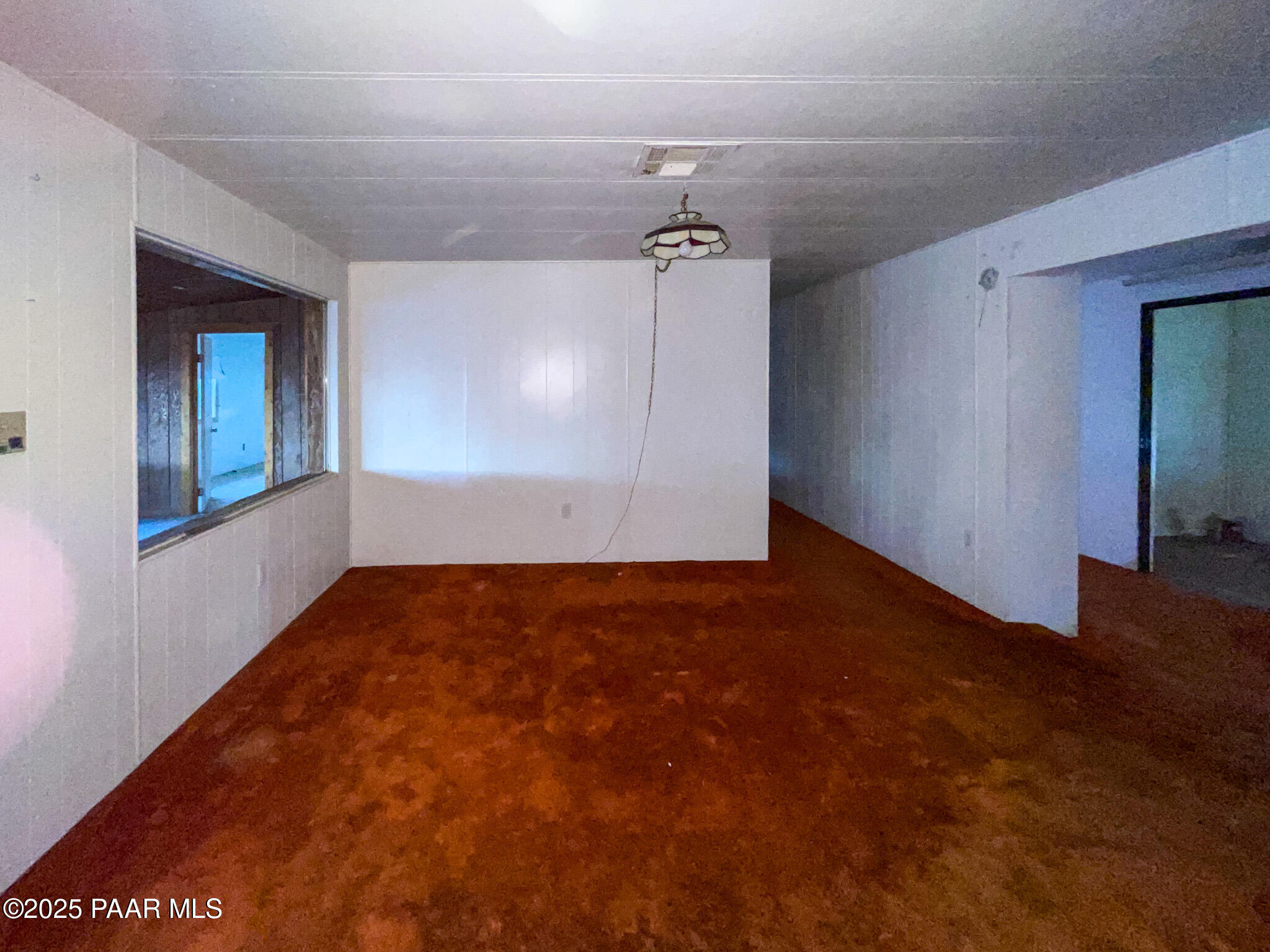 10198 Miami Street Mayer, AZ 86333 - Photo 15 of 29 an empty room with windows