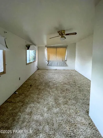 a view of hallway with a large window