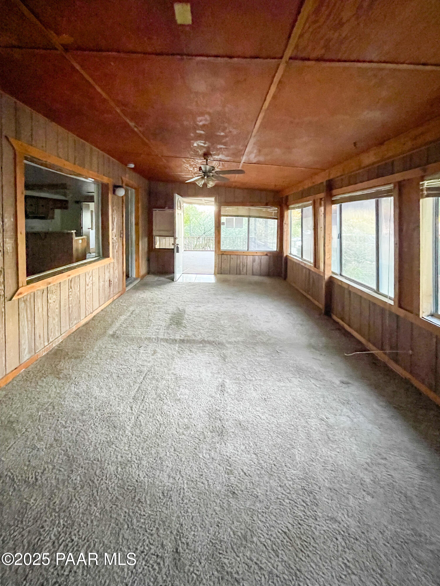10198 Miami Street Mayer, AZ 86333 - Photo 25 of 29 a view of hallway with a large window