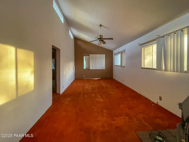 a view of hallway with windows