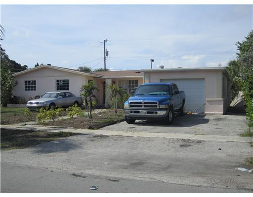 a car parked in front of a house
