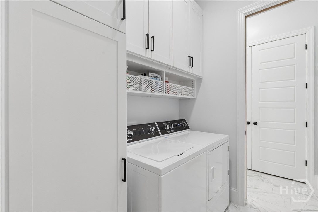 18 Golf Drive Pooler, GA 31322 - Photo 23 of 39 Custom Built in Cabinets in Laundry Room off the Primary Bedroom/Bathroom