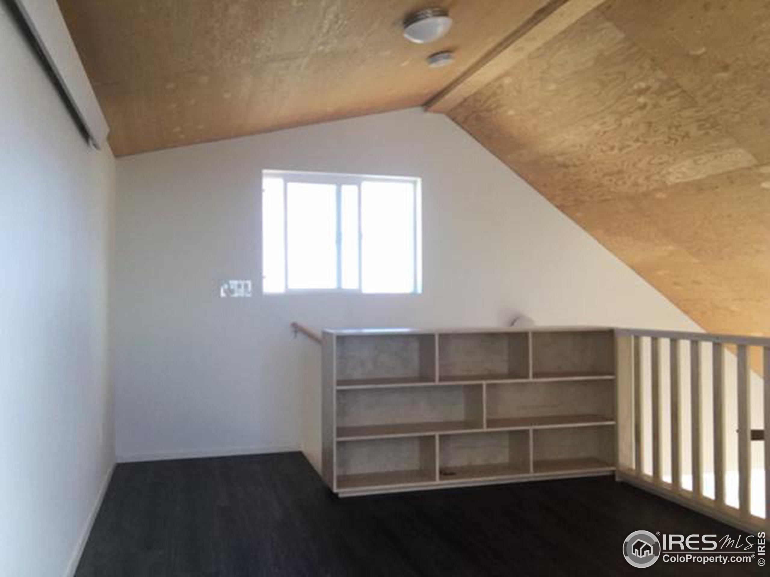 2518 Whale Rock Road Bellvue, CO 80512 - Photo 15 of 19 a view of walk in closet with empty racks