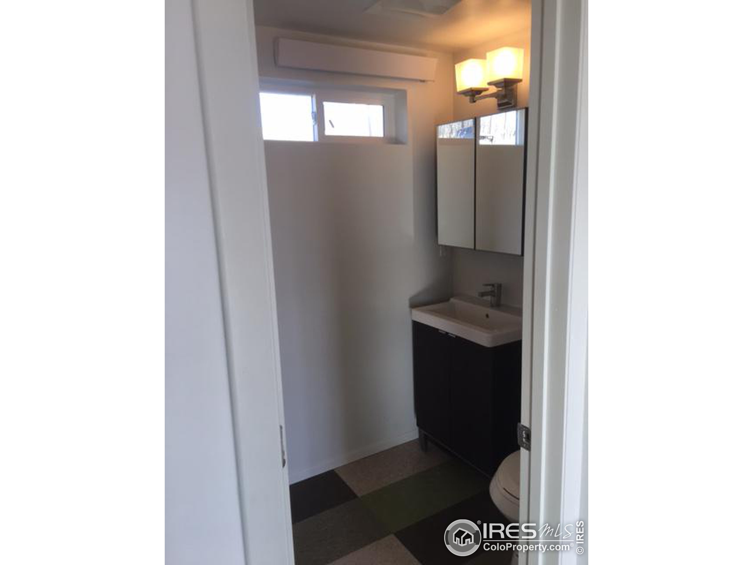 2518 Whale Rock Road Bellvue, CO 80512 - Photo 16 of 19 a bathroom with a sink