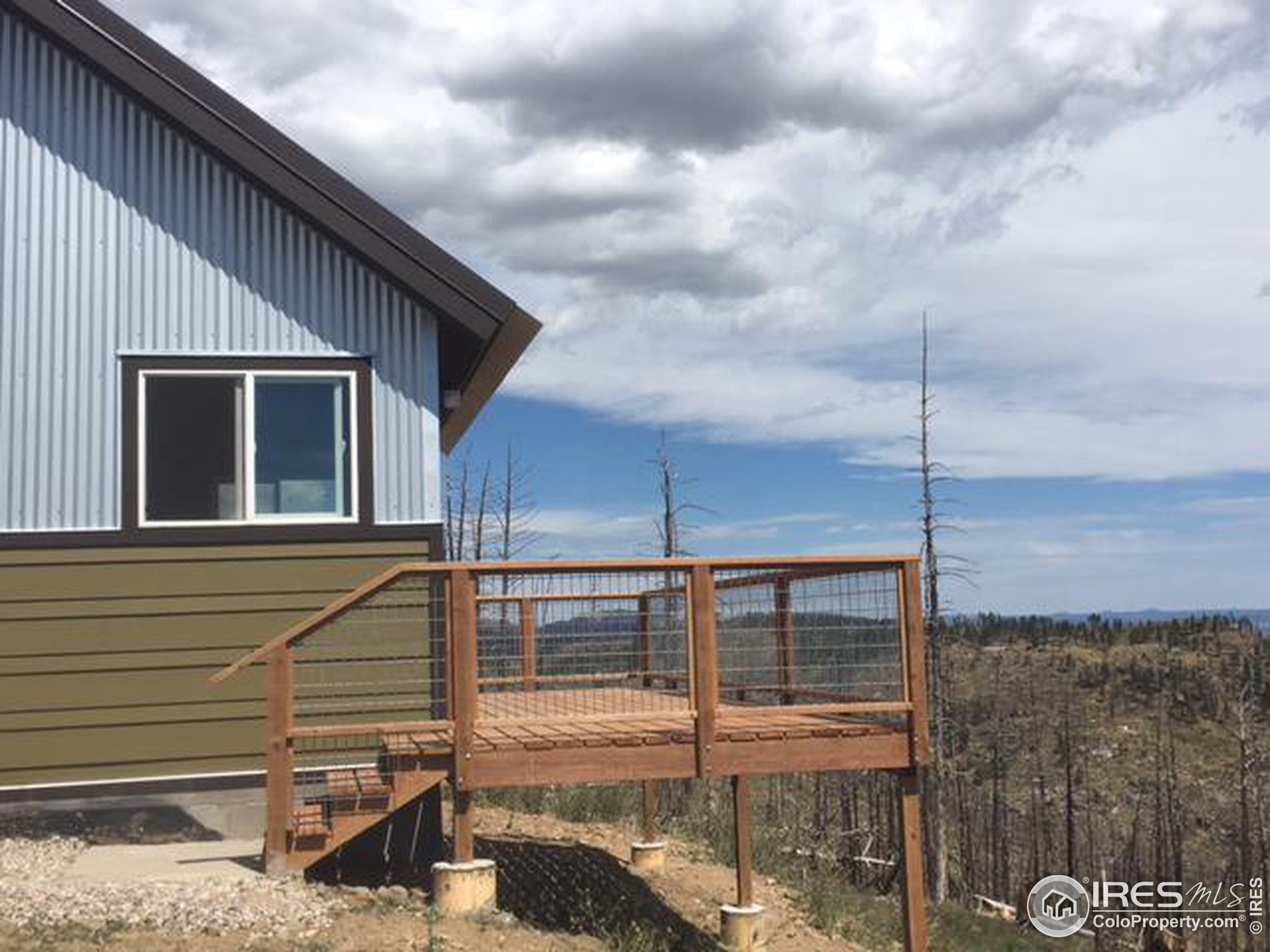 2518 Whale Rock Road Bellvue, CO 80512 - Photo 17 of 19 a balcony view with a outdoor space