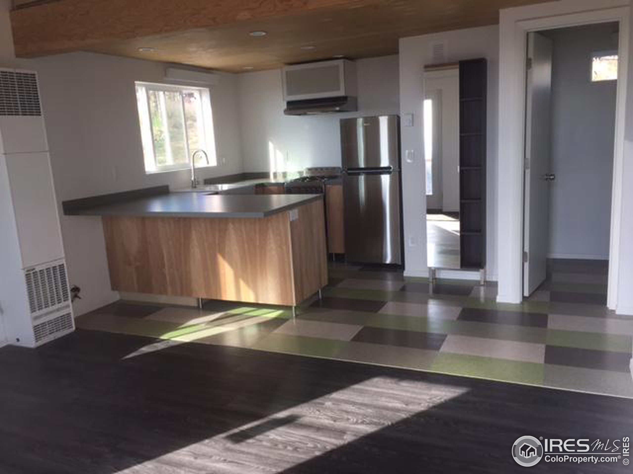 2518 Whale Rock Road Bellvue, CO 80512 - Photo 6 of 19 a view of a kitchen with a sink