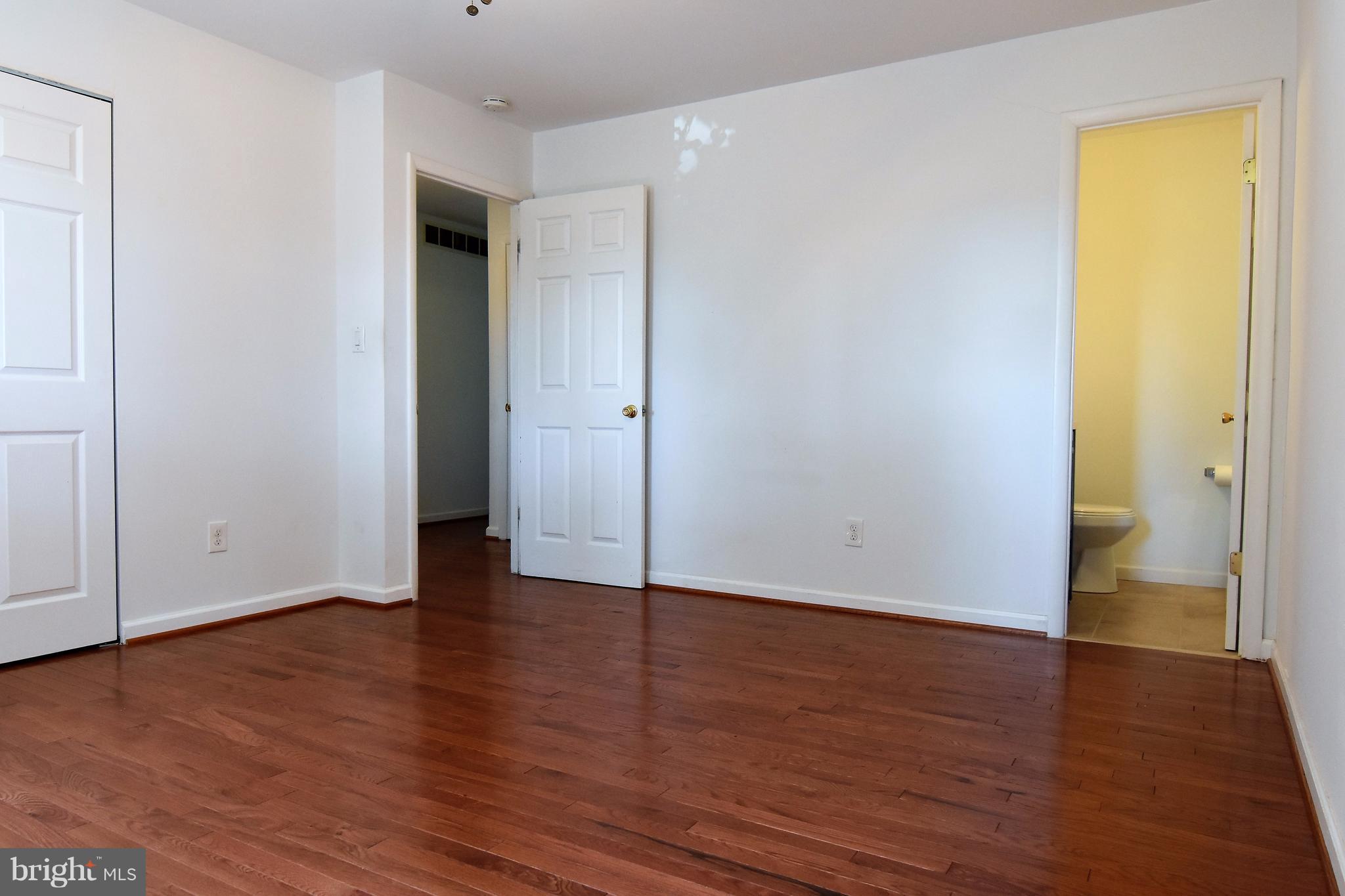 221 Dunlap Road Pasadena, MD 21122 - Photo 11 of 30 12x13 master bedroom w/ half bath