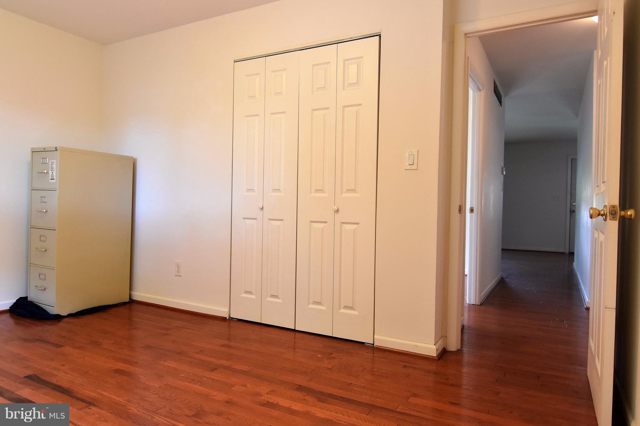 221 Dunlap Road Pasadena, MD 21122 - Photo 17 of 30 9x10 bedroom #3 with exit to backyard
