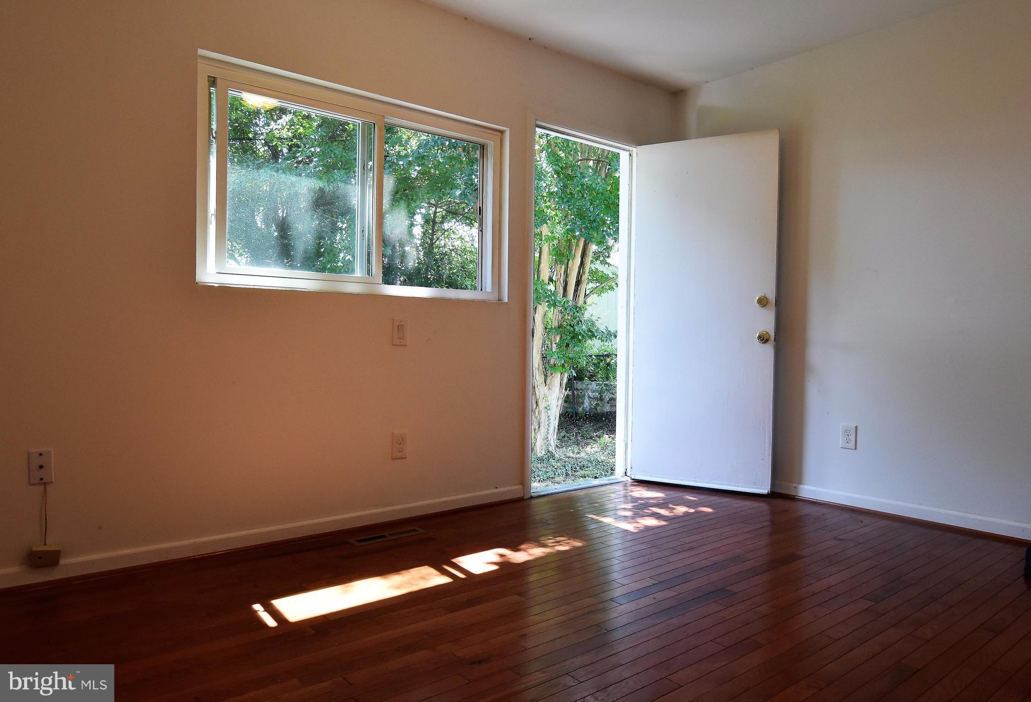 221 Dunlap Road Pasadena, MD 21122 - Photo 20 of 30 9x10 bedroom #3 with exit to back yard
