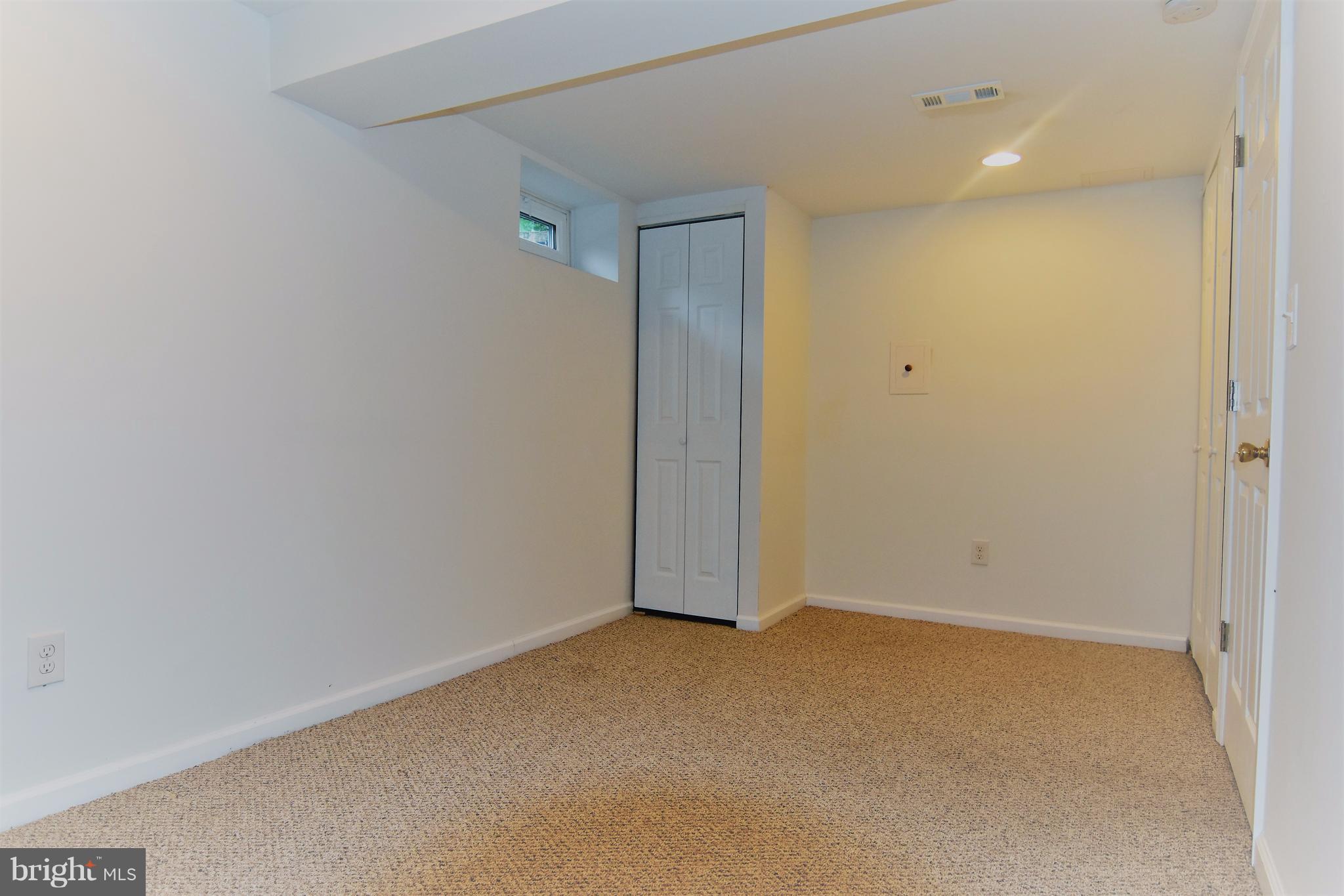 221 Dunlap Road Pasadena, MD 21122 - Photo 21 of 30 lower level bedroom #4 8x16