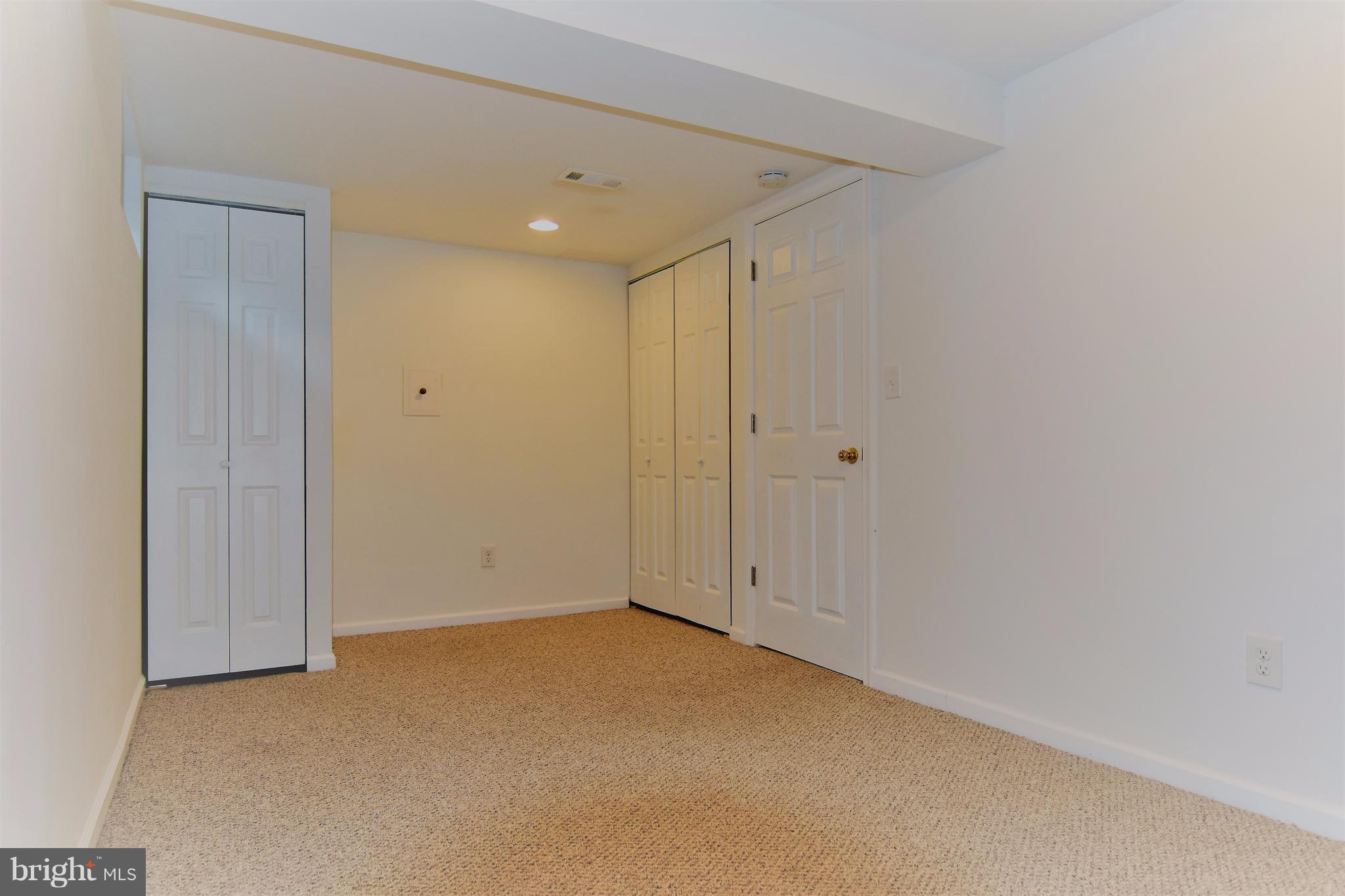 221 Dunlap Road Pasadena, MD 21122 - Photo 22 of 30 Bedroom #4 lower level 8x16