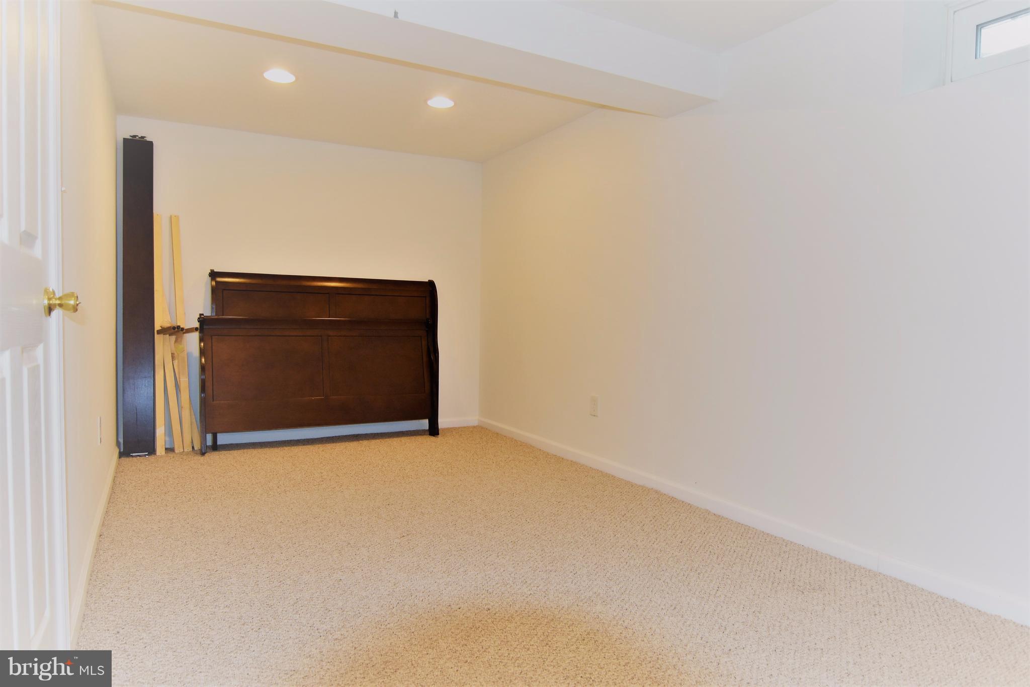 221 Dunlap Road Pasadena, MD 21122 - Photo 23 of 30 Bedroom #4 lower level 8x16