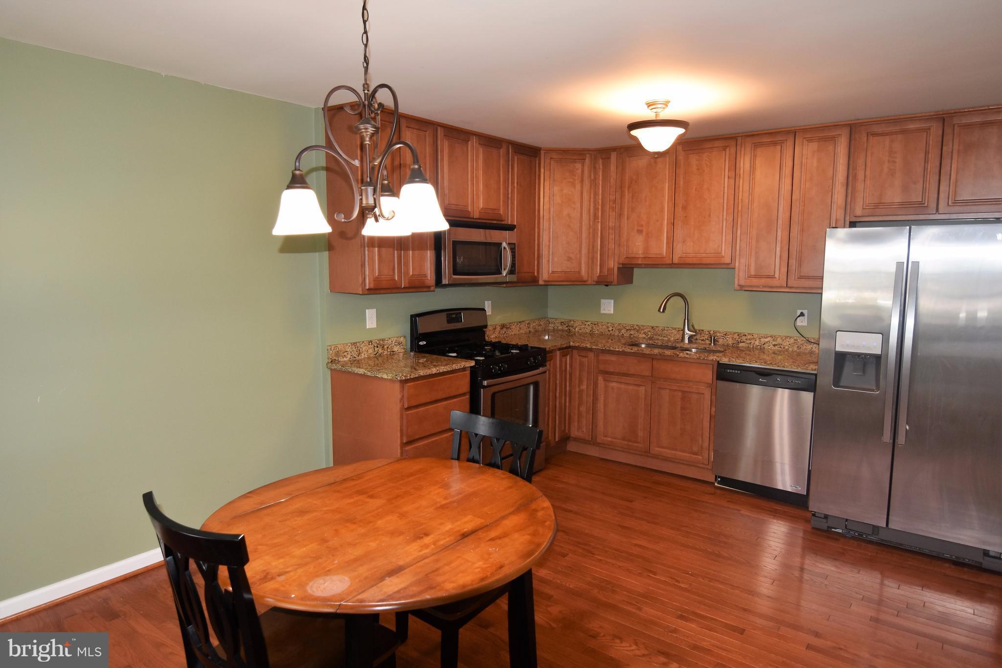 221 Dunlap Road Pasadena, MD 21122 - Photo 5 of 30 11x19 Kitchen w/ stainless steel appliances