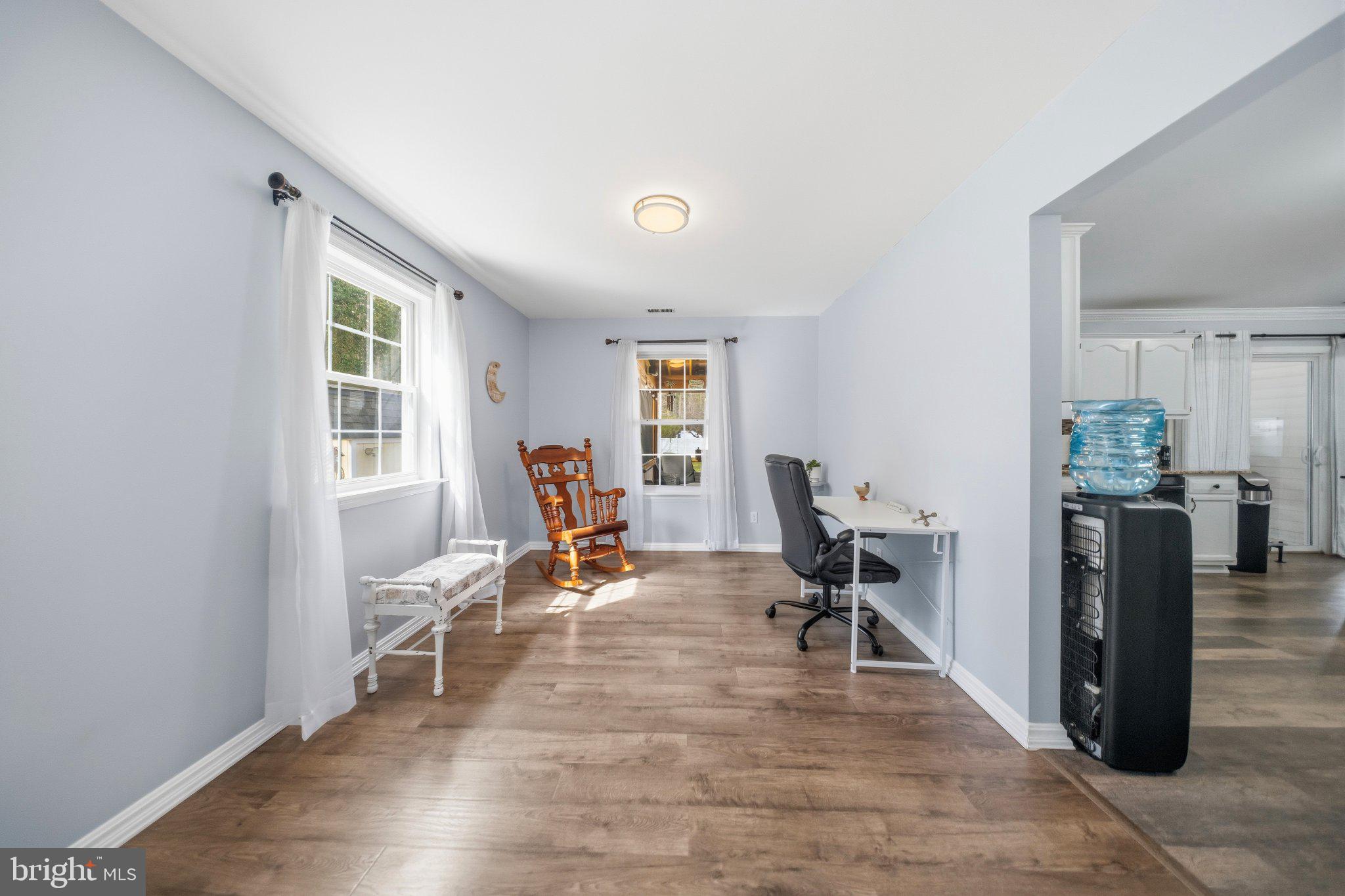 1221 Cedar Lane Edgewater, MD 21037 - Photo 11 of 58 a view of a workspace with furniture and a window